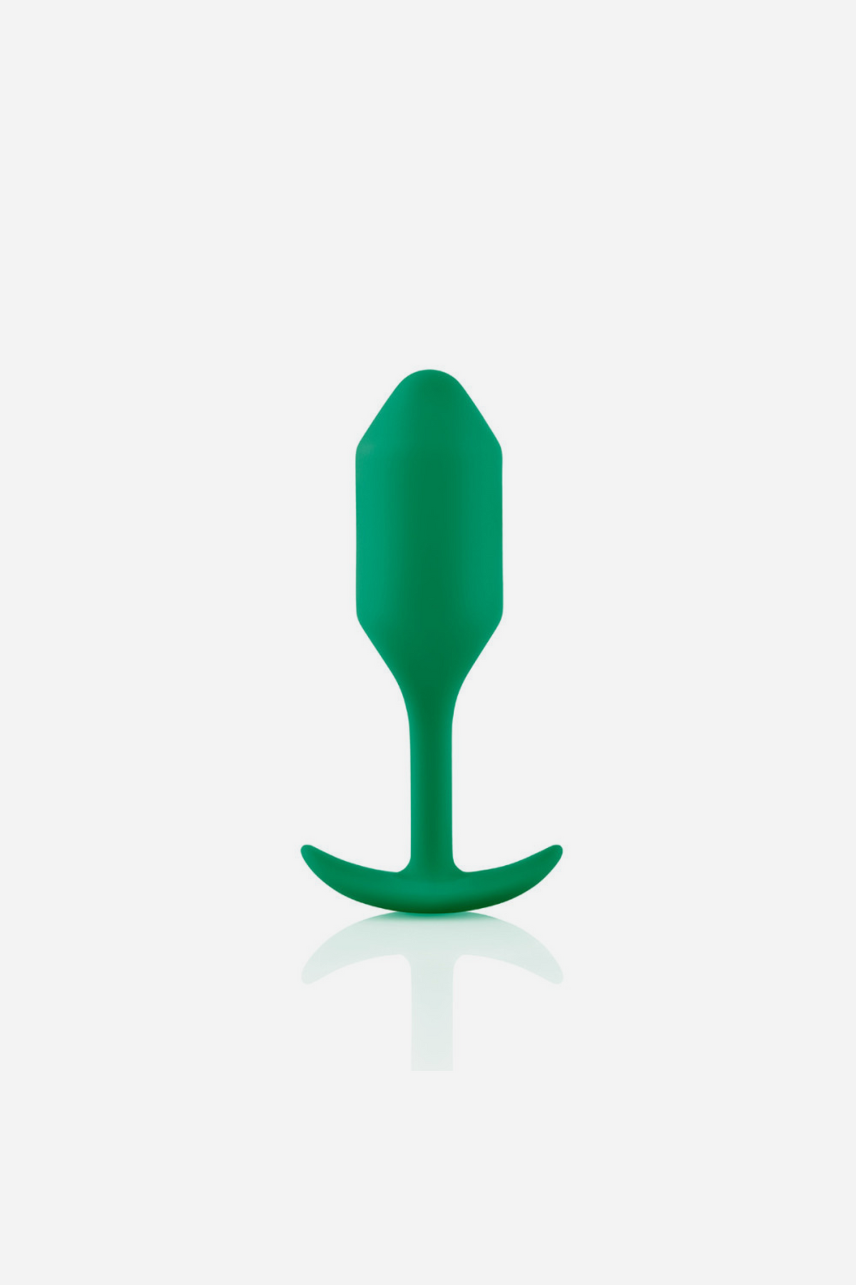 B-Vibe Snug Plug 2 in green standing upright, showing the weighted torpedo-shaped bulb, slim flexible neck and wide flat base on grey