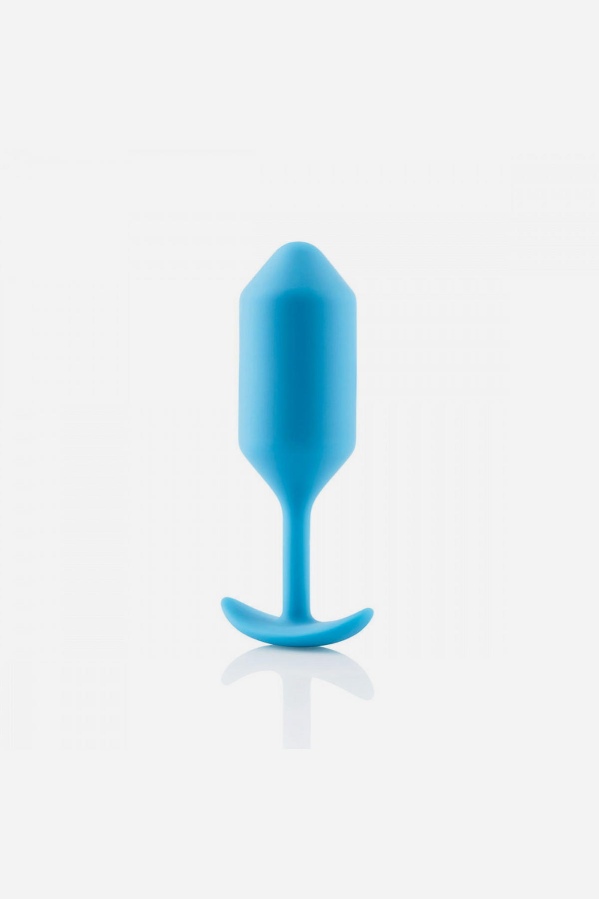 B-Vibe Snug Plug 3 large weighted butt plug in Teal standing upright, showing the tapered bulb, neck and anchor base on grey