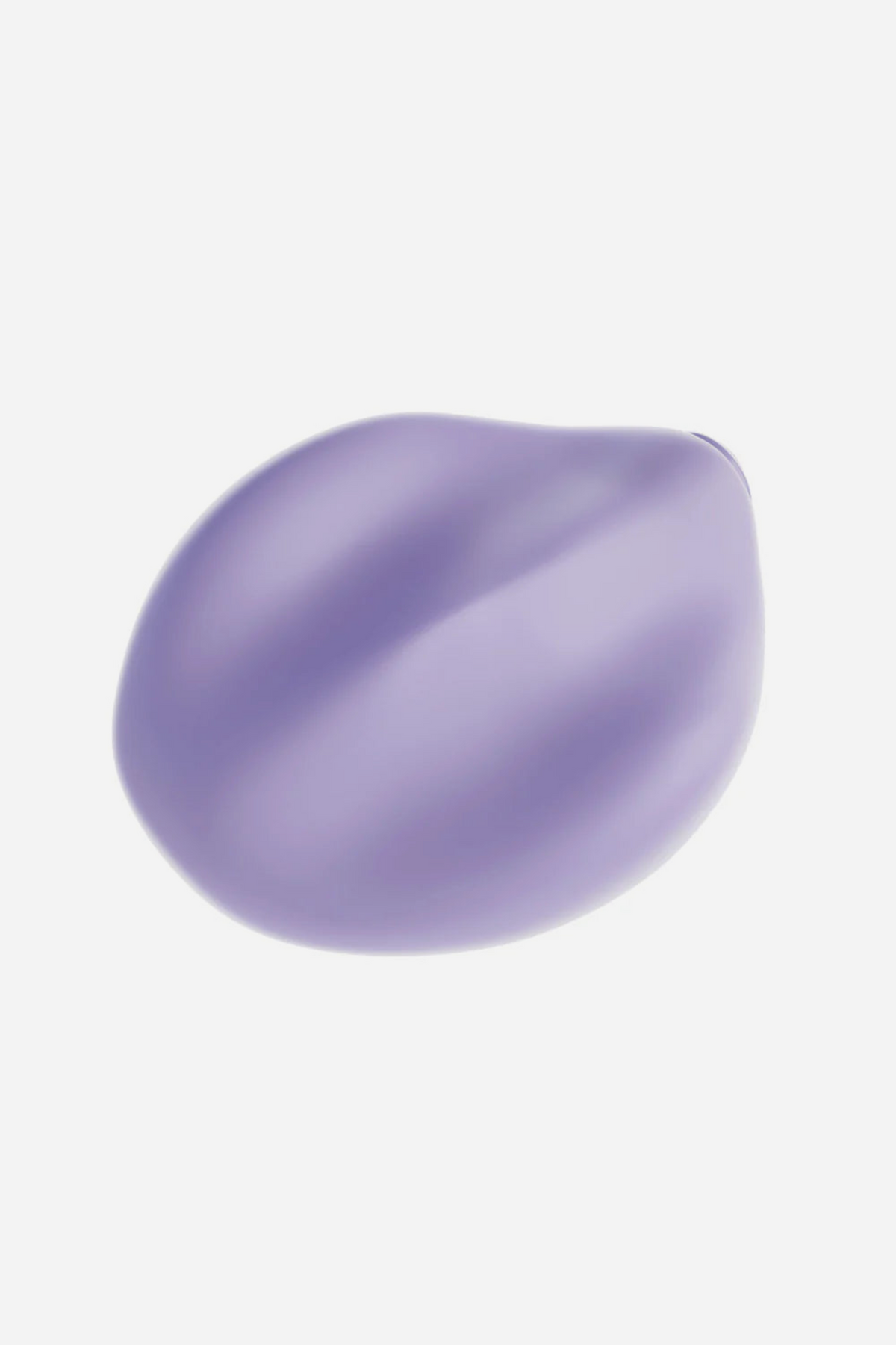 Side profile of the lavender Be Urself Vibrating Pulse Pad showing its low, compact curved body made from body-safe platinum-cured silicone