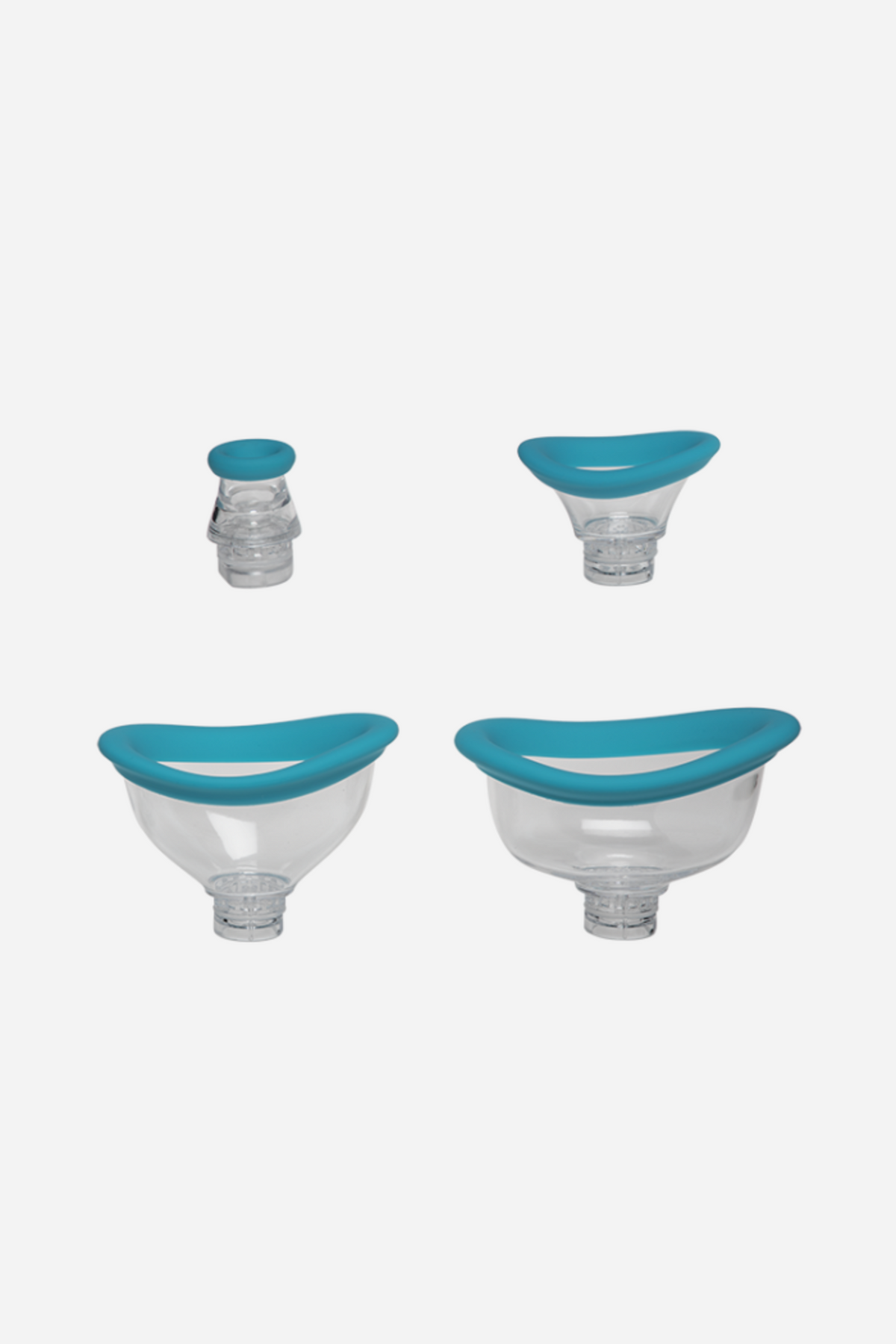 The four interchangeable clear suction cups with soft sky blue silicone rims included with the Bloom pump, sized for different body areas