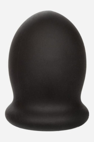 Closed rounded end of the black Boundless Pleasure FTM silicone stroker standing upright on its wide flared base on a light grey background