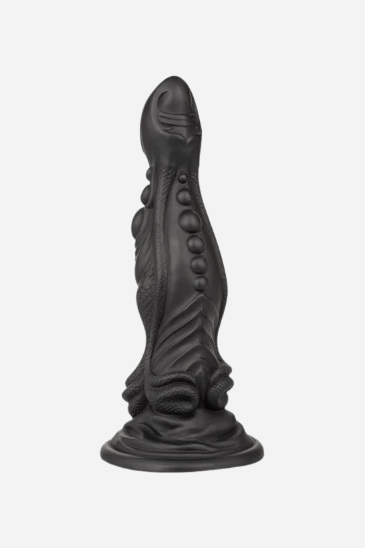 Black Colossus Monster Fantasy Dildo standing upright on its suction cup base, showing the ridged and textured creature shaft, on grey