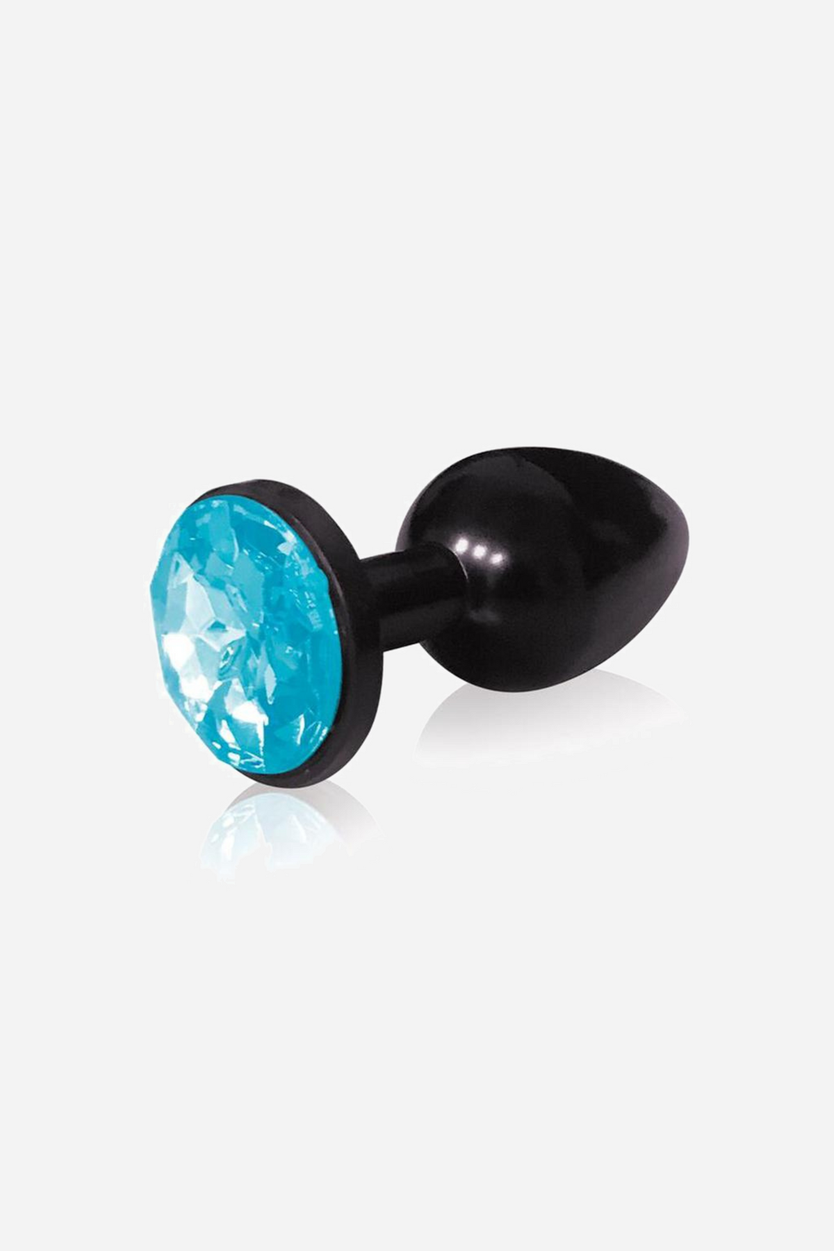The same small black metal plug shown with a bright aqua faceted gem in its flared base, lying on its side against a plain grey backdrop.
