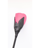 top down view of the petals on the pink rose tip of the kinky leather crop