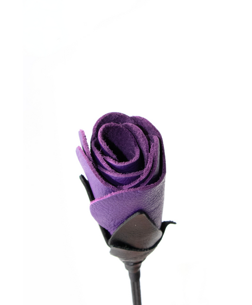view looking into the rosebud shaped bdsm crop for ikinky mpact play. purple rose