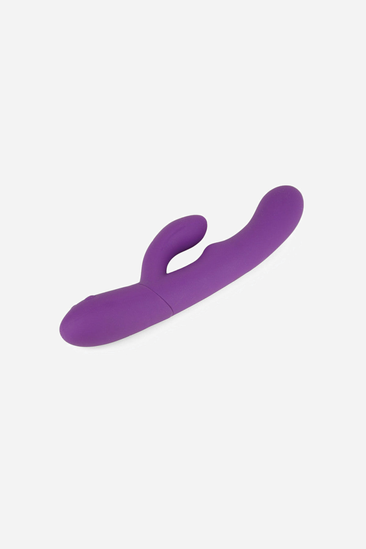 Side view of the purple Ultra Rabbit lying down, showing its ribbed handle and control button