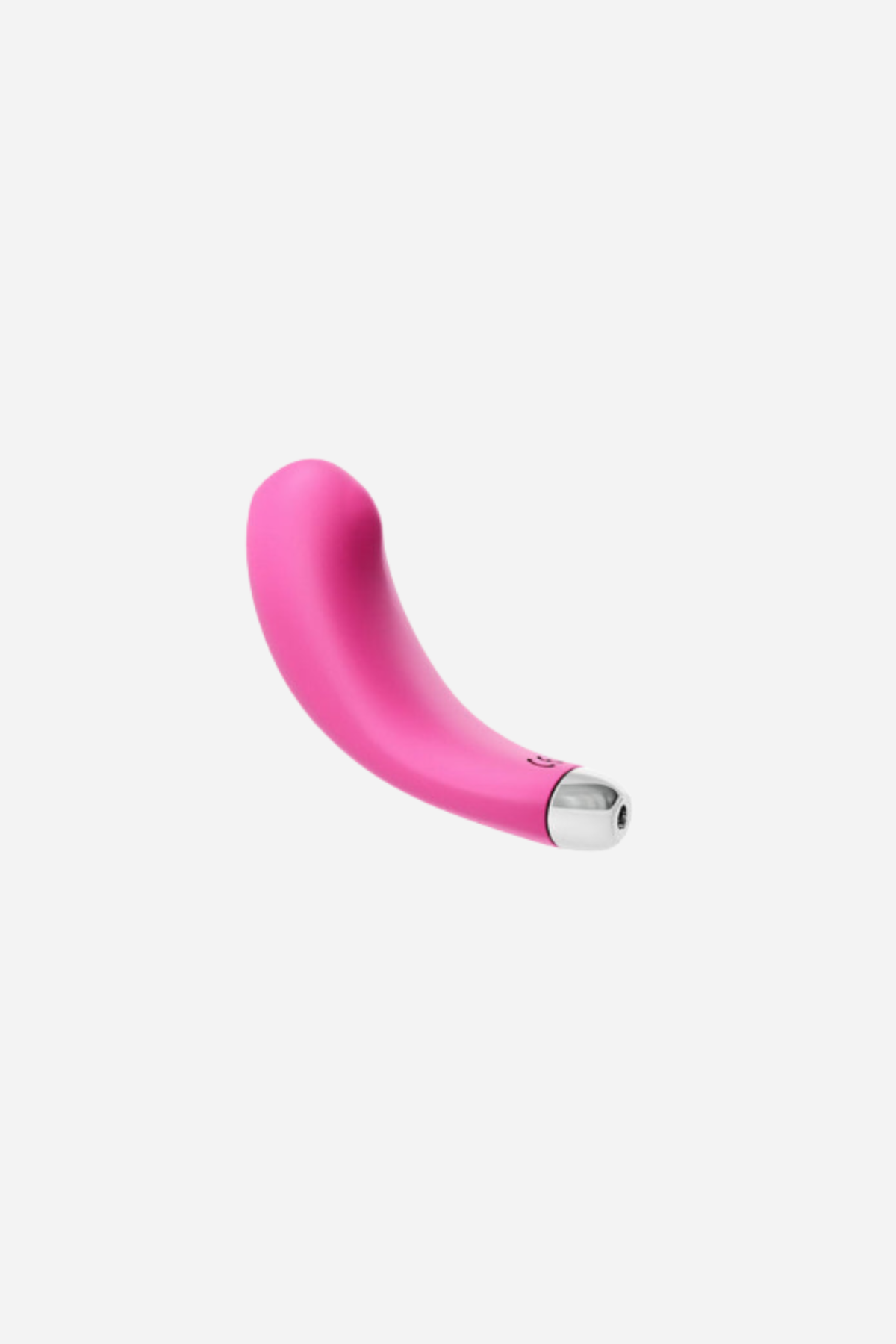 The pink Flexi Niki vibe alone on grey, a slim curved silicone body tapering from a rounded tip to a flat silver charging contact.
