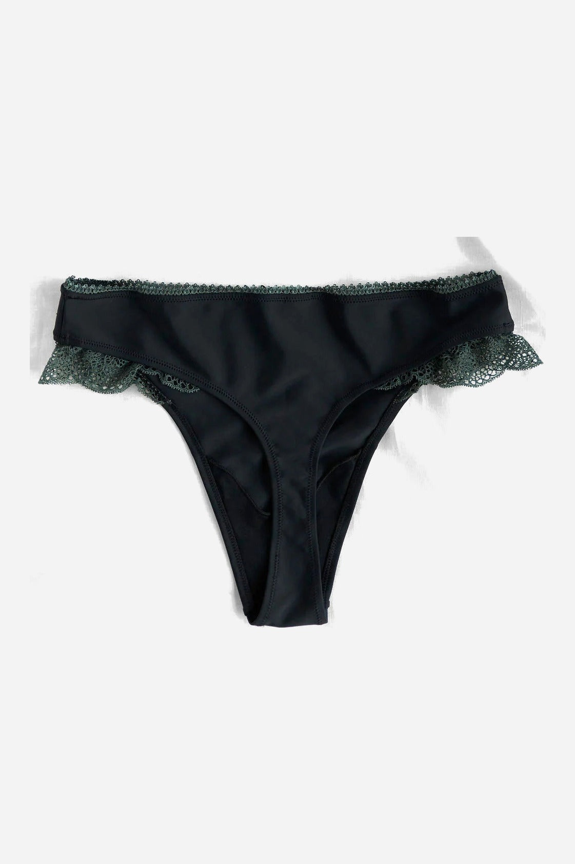 Back flat lay of the Floruisse Lucy lace thong showing the black jersey thong back and slate sage ruffled lace side trim