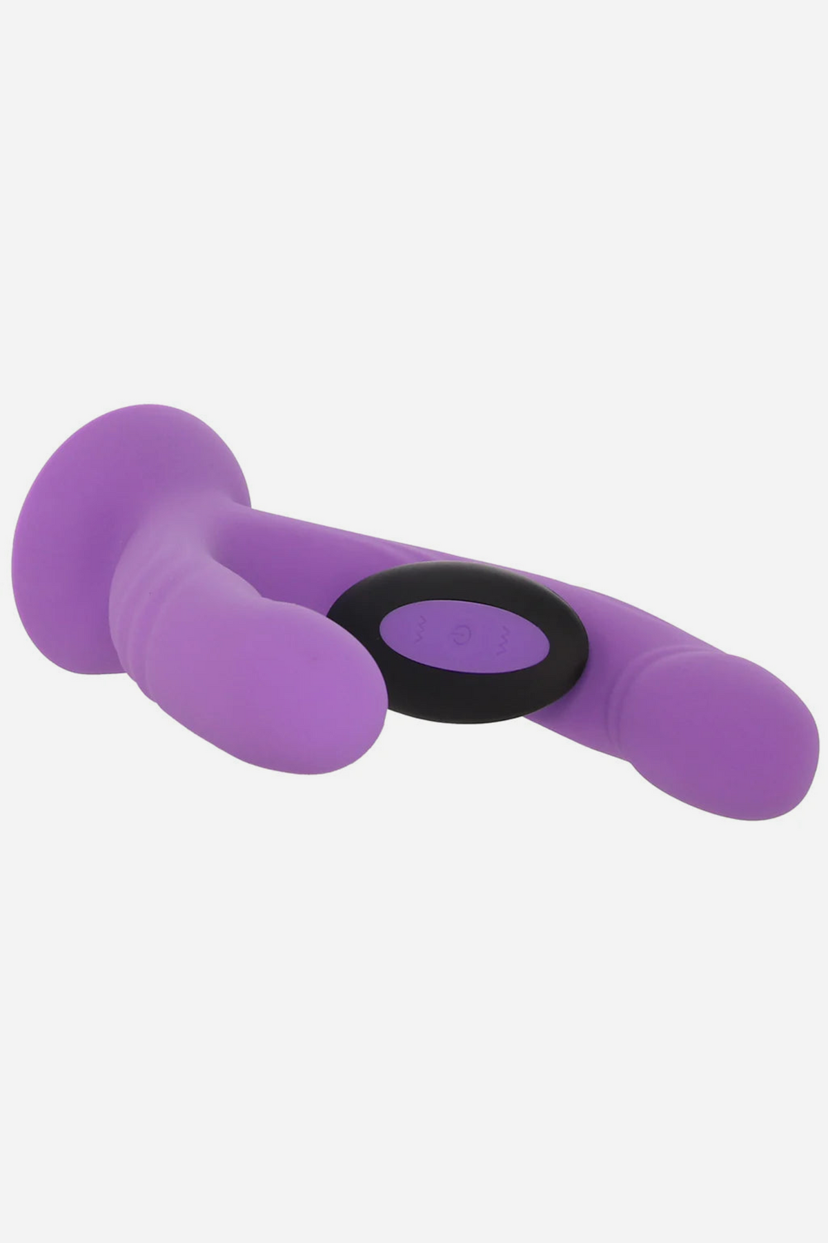 Get In Ya Dual Dildo lying on its side with the black vibrating unit around the base, ready for hands-free grinding or harness play