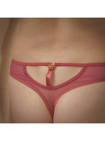 rear view of the Hearts of Venus Keyhole Thong in Copper Rose on a white model 