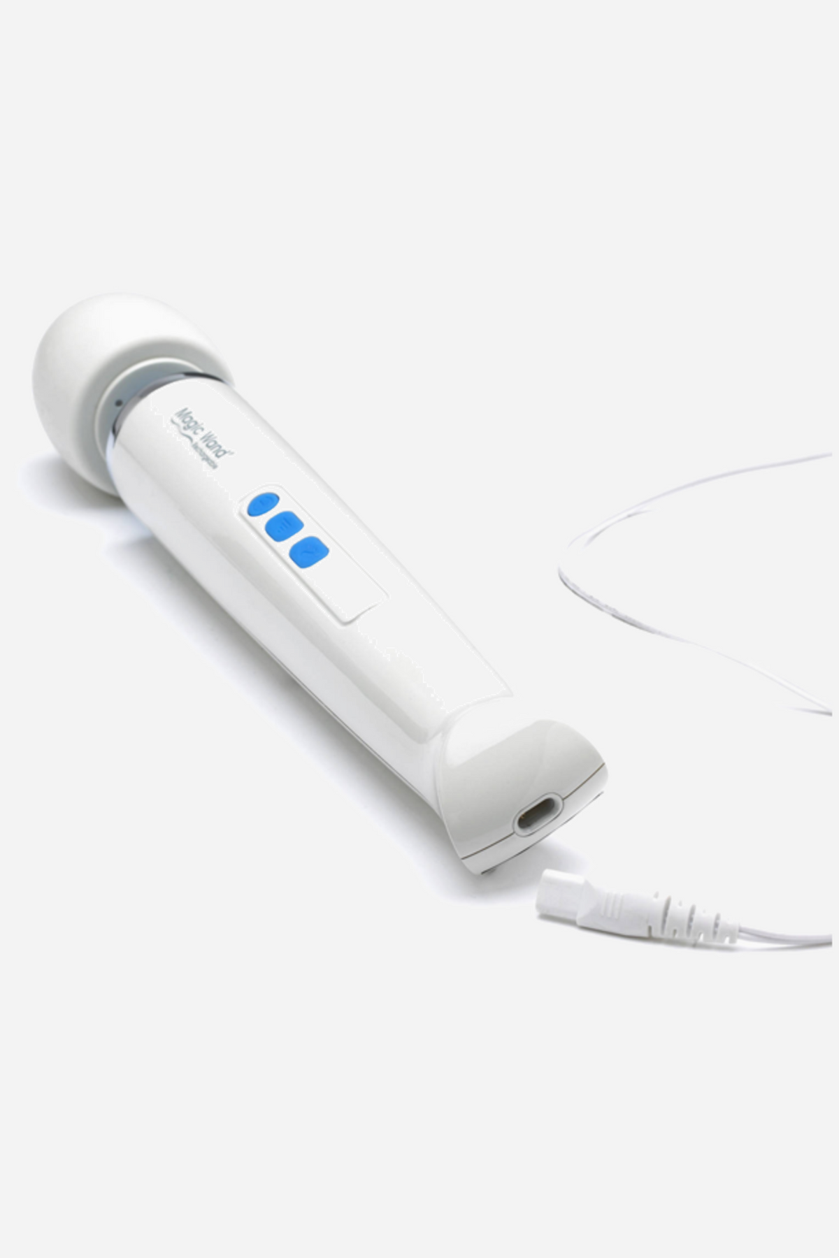 The white Hitachi Magic Wand Rechargeable lying diagonally on grey with its charging lead trailing from the base of the handle.