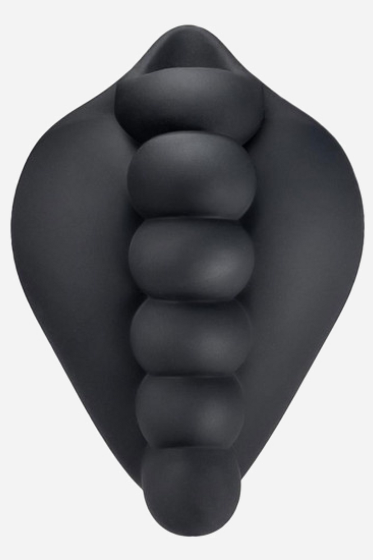 The black grinding pad seen front on, teardrop shaped with four rows of soft rounded nubs across the face for grinding against