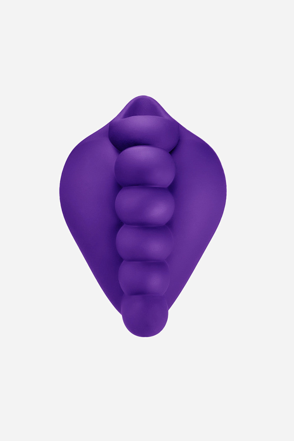 The purple grinding pad seen front on, teardrop shaped, with four rows of plump silicone nubs running down its face for grinding
