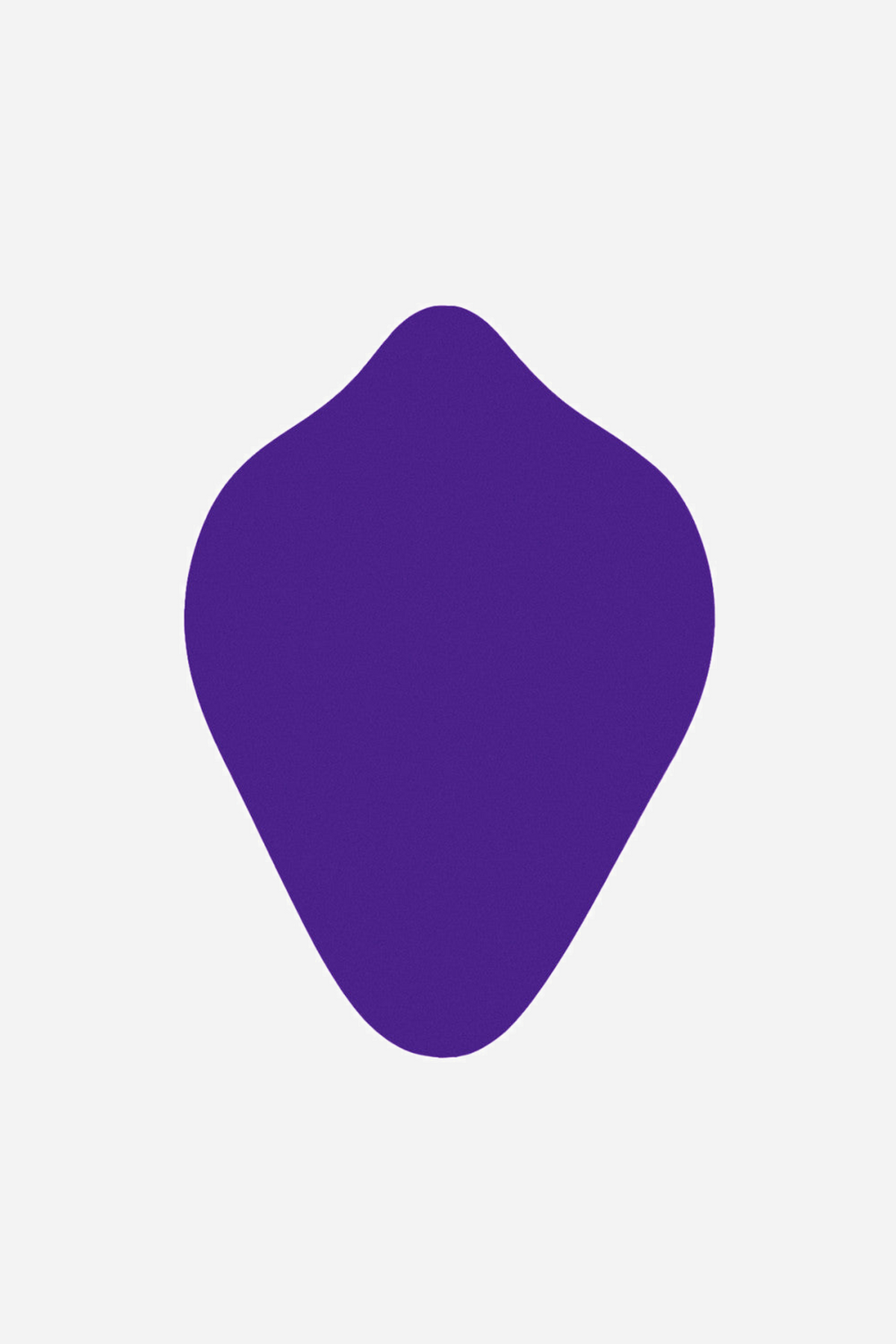 The smooth back of the purple grinding pad, showing the plain teardrop shape that sits flat against a harness or the body itself