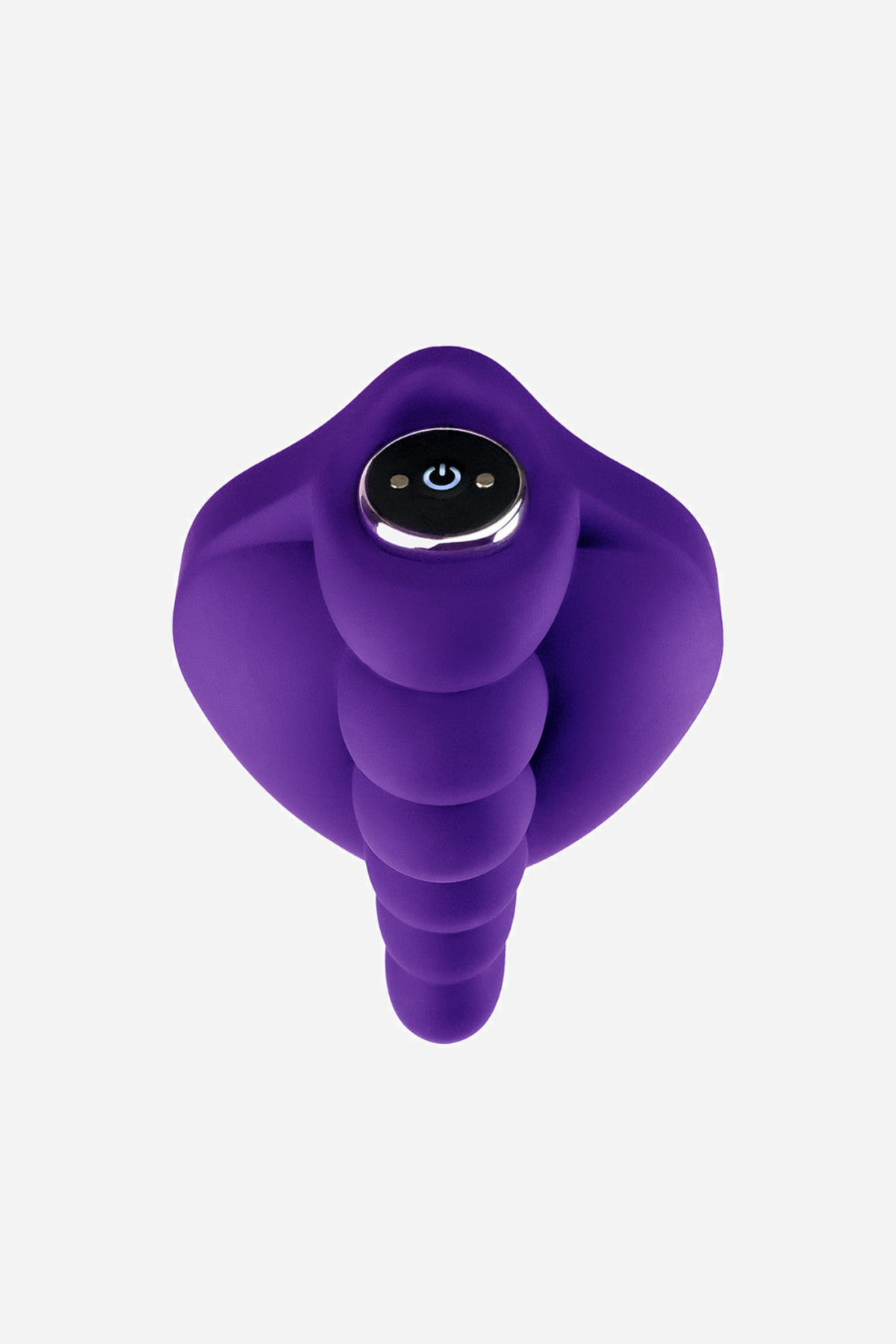 The purple grinding pad with the bullet vibe slipped into its pocket, showing the control button sitting between the nub rows