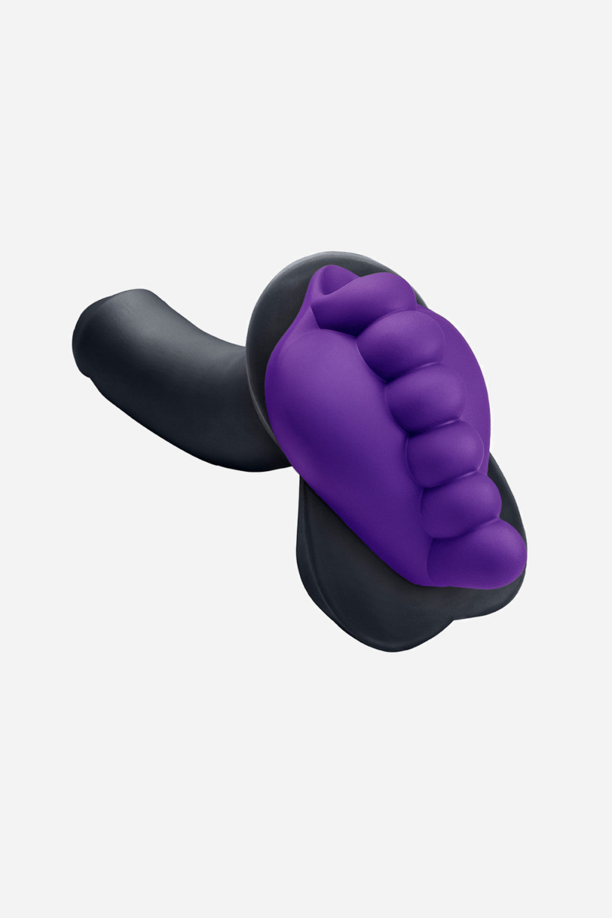The purple grinding pad paired with a black shaft, seen from the side, showing how the pad wraps around the base of the toy shaft