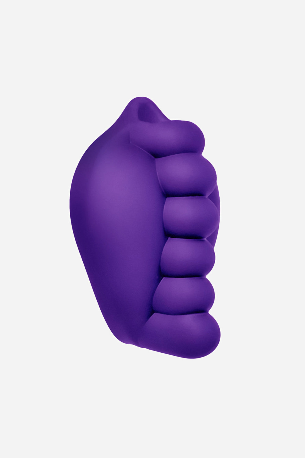 Three quarter view of the purple grinding pad, showing the depth of the silicone nubs and the soft curve of the teardrop shape