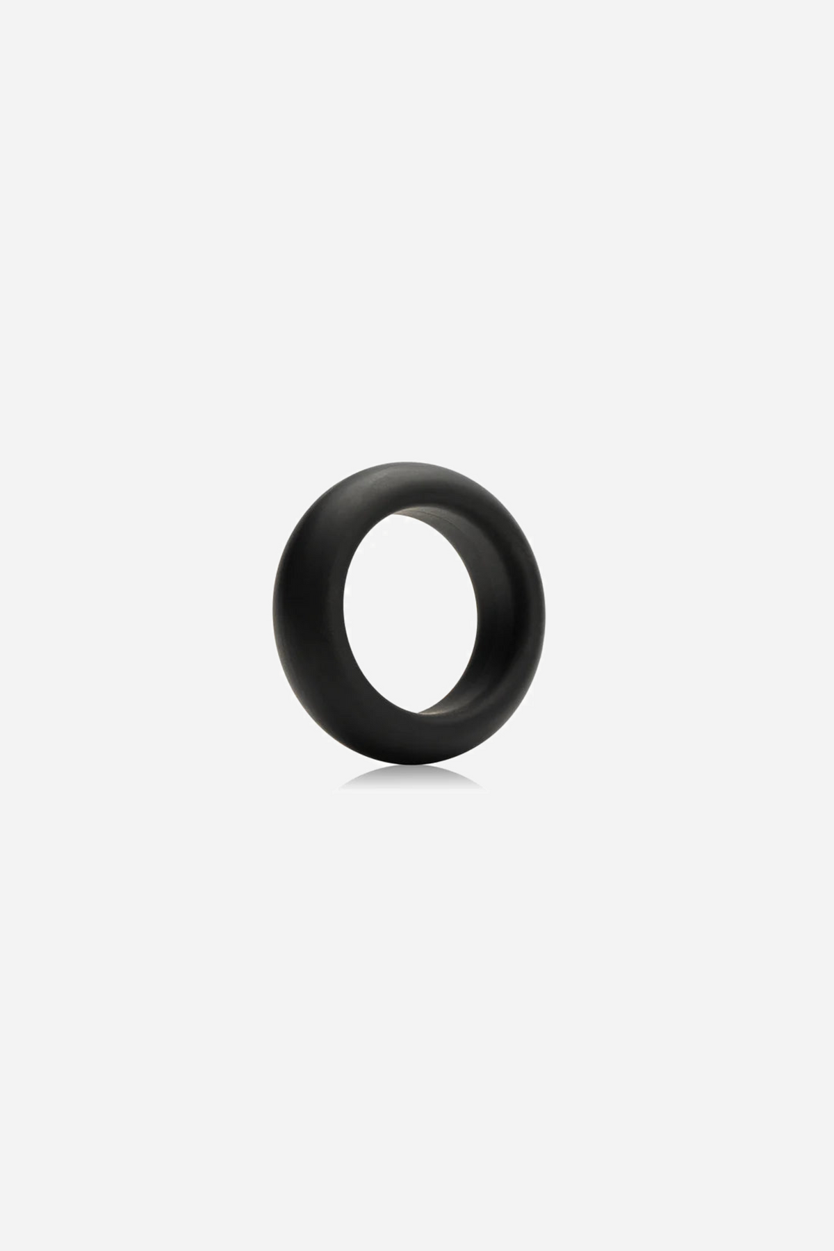Black silicone C-ring tilted upright in side profile, showing the thickness and taper of the band
