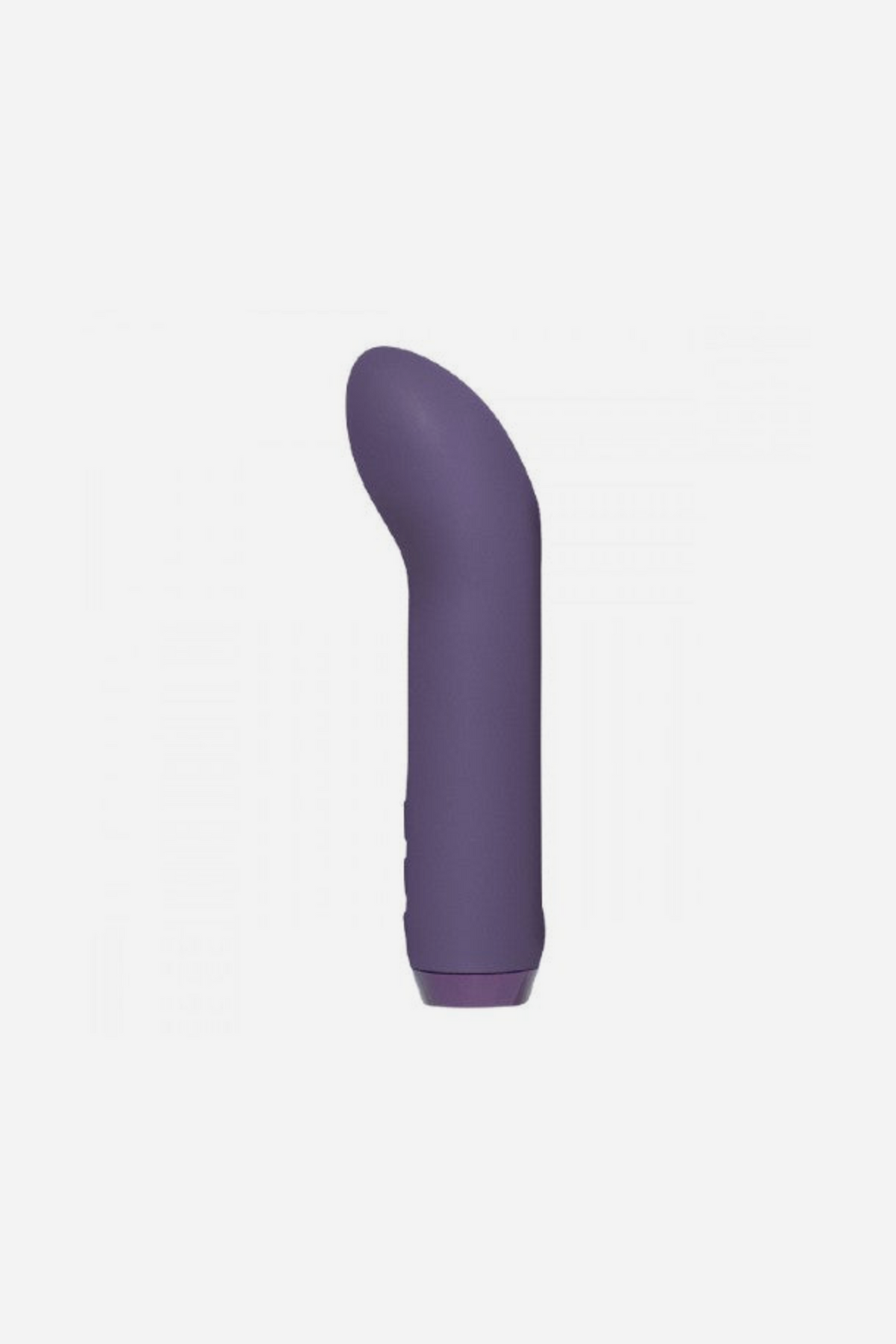 Je Joue G-spot bullet vibrator in Purple standing upright, showing the curved tip and control buttons at the base on light grey