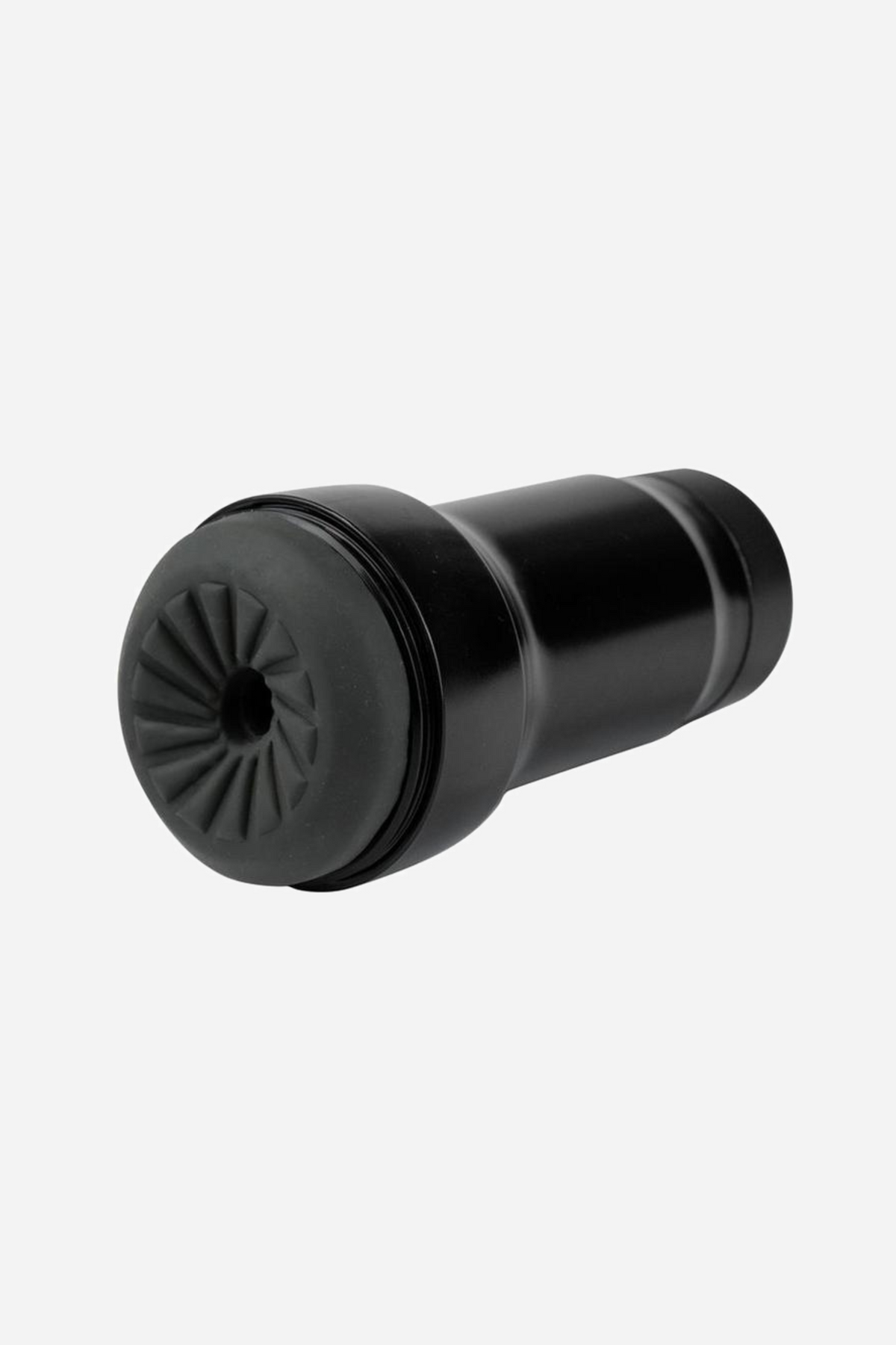 Black Kiiroo Pocket Feel stroker lying at an angle, its smooth matte case ending in a deeply fluted opening at the near end of the sleeve.