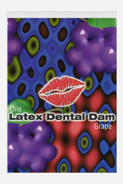 Grape flavored latex dental dam packet with a bright psychedelic pattern, purple grapes and a red lips logo, front view