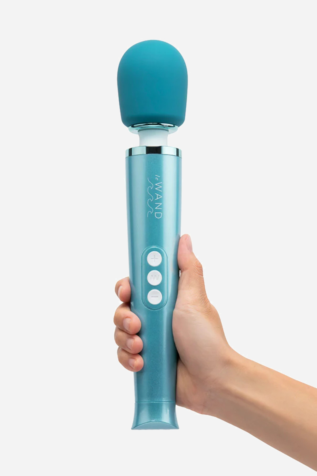 The Le Wand Dive wand in teal held upright in a hand, showing the soft silicone head, ribbed grip and the three control buttons