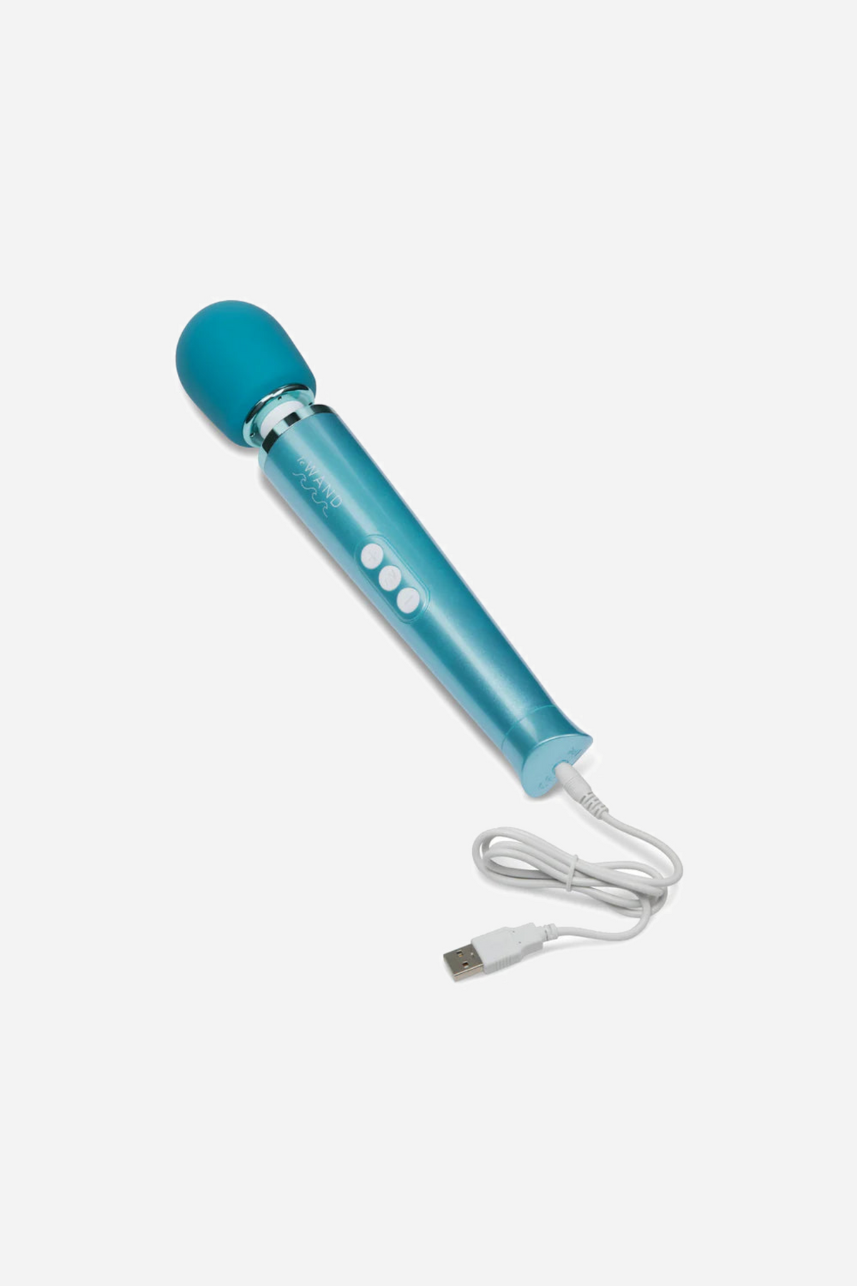 The teal Le Wand Dive wand lying at an angle with its white magnetic charging cable attached at the base of the handle and coiled beside it