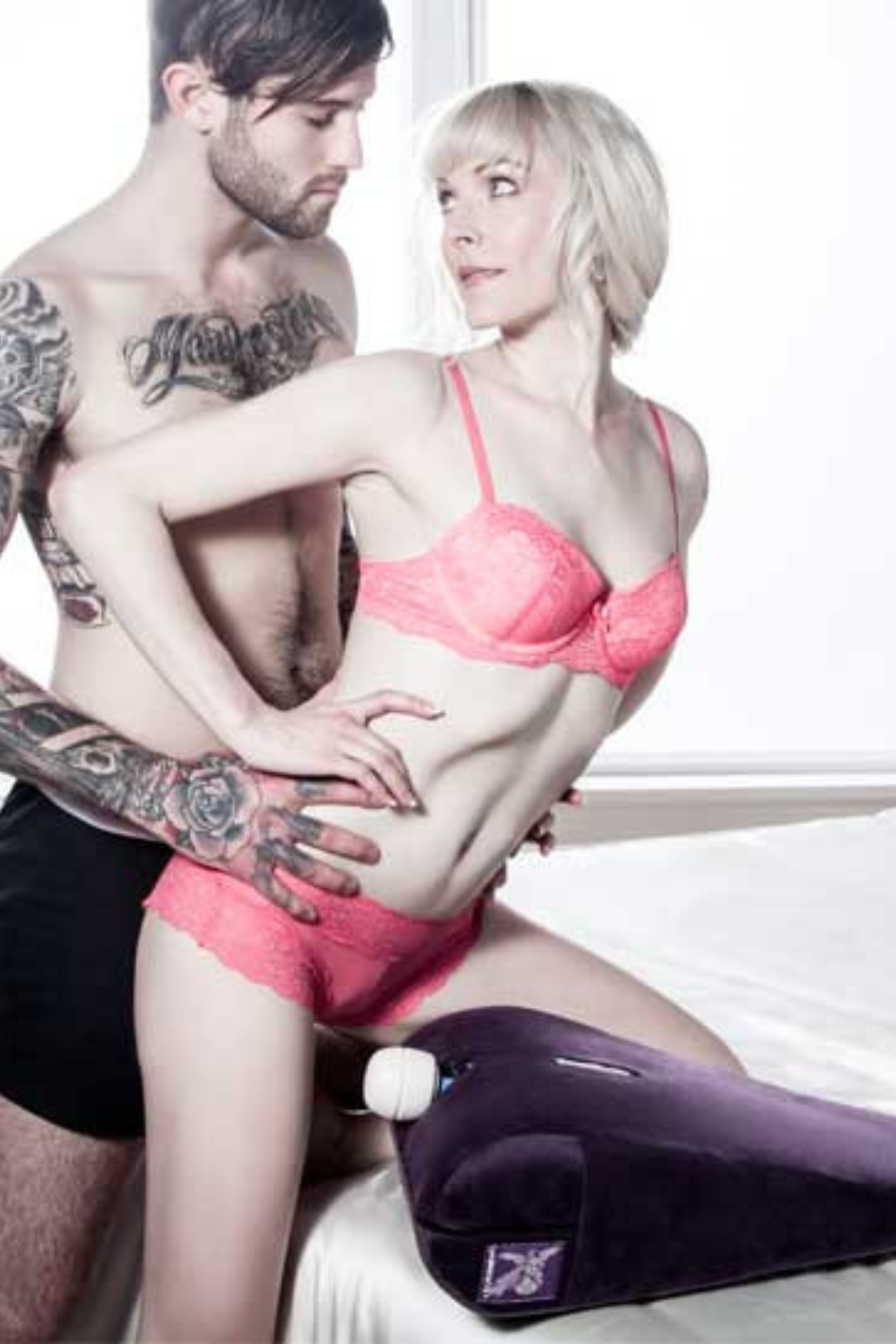 couple hovering over the Liberator Axis Magic Wand Mount