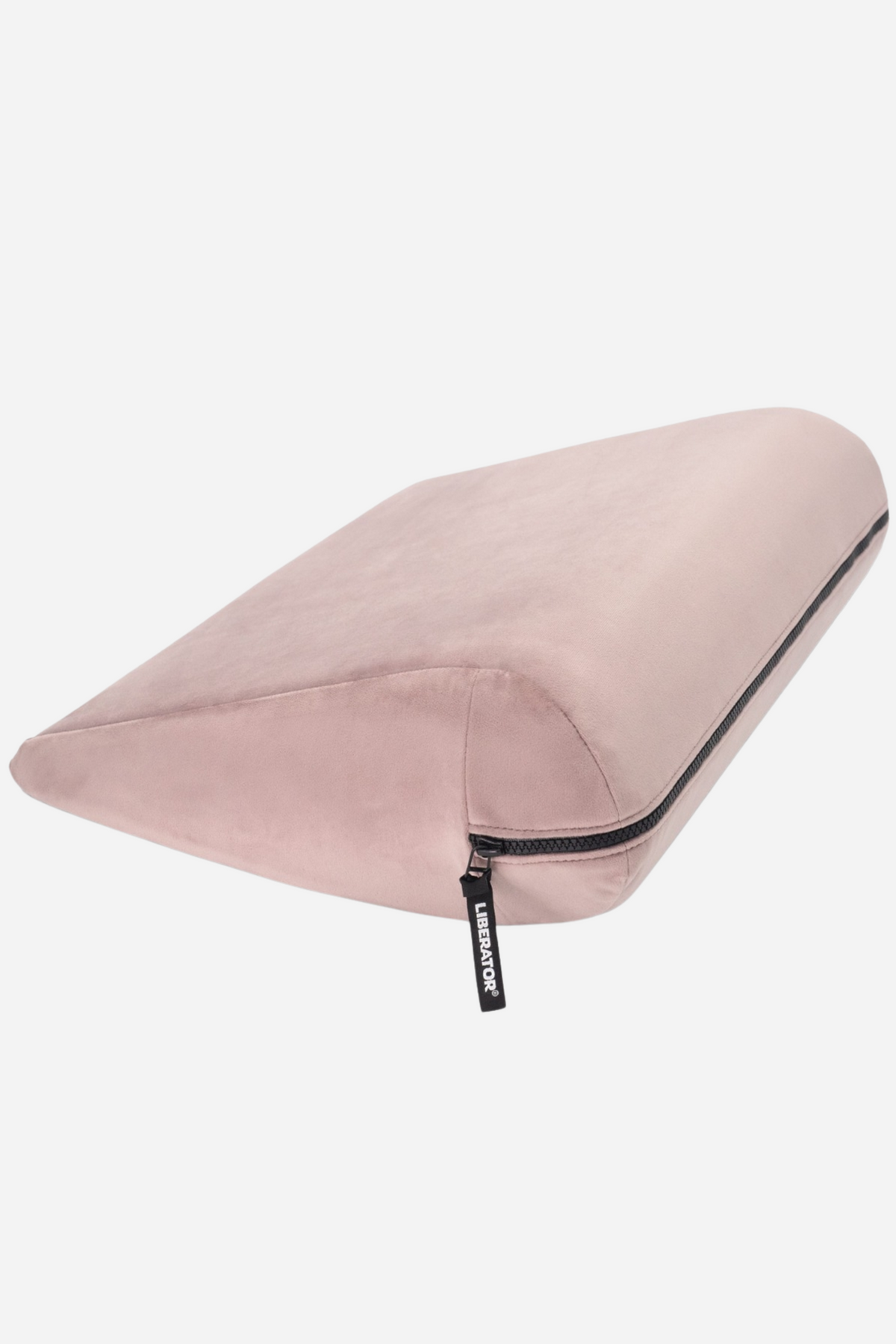 Liberator Jaz positioning wedge in soft rose pink microvelvet, showing its gentle slope and the black zip on the removable washable cover