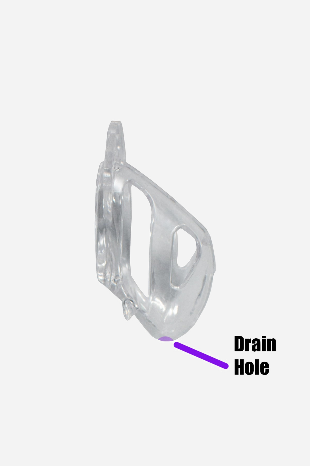 The clear Vice Mini cage with a purple arrow and label pointing out the drain hole at the tip of the cage for use in the shower