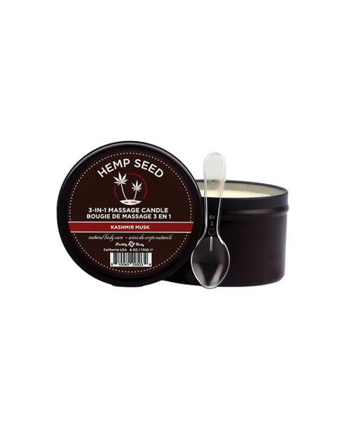 soy massage candle in kashmir musk sent. with plastic spoon to scoop oil onto partner