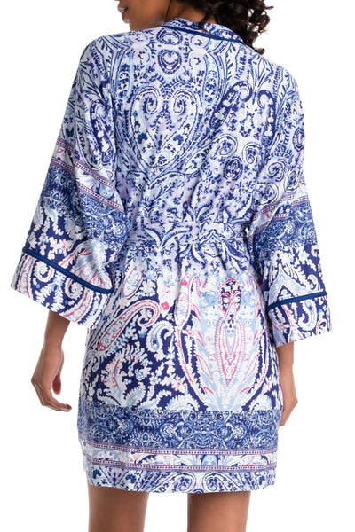 model shows off the paisley pattern of the soft elevated loungewear robe