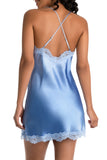 model wears a blue ombre slip & shows us the back with criss cross straps