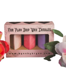 boxed set of three wax play heart shaped pillar candles in pink, red, and purple. box reads for play drip wax candles
