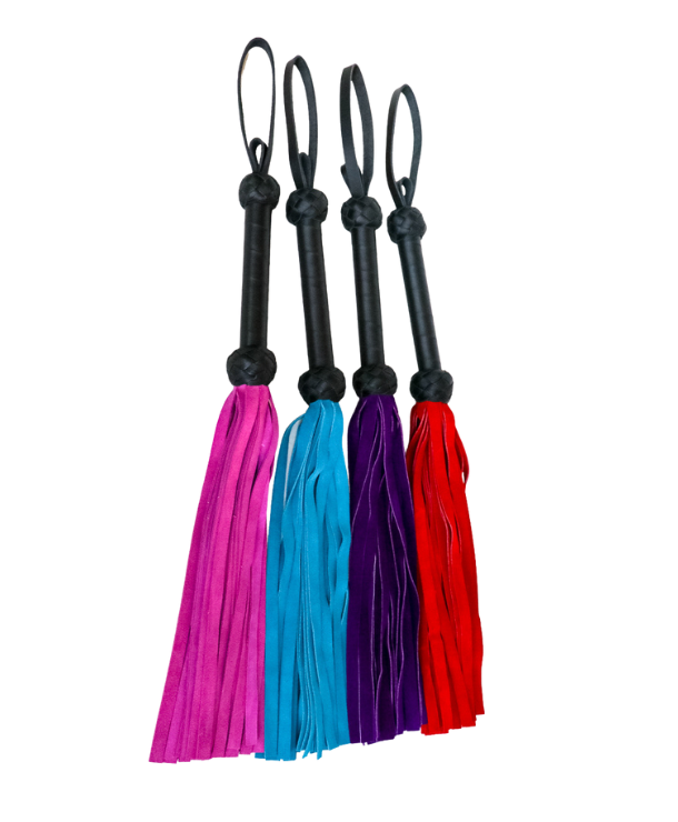 four of the same style beginner's floggers lined up. one is pink, teal, purple, and red