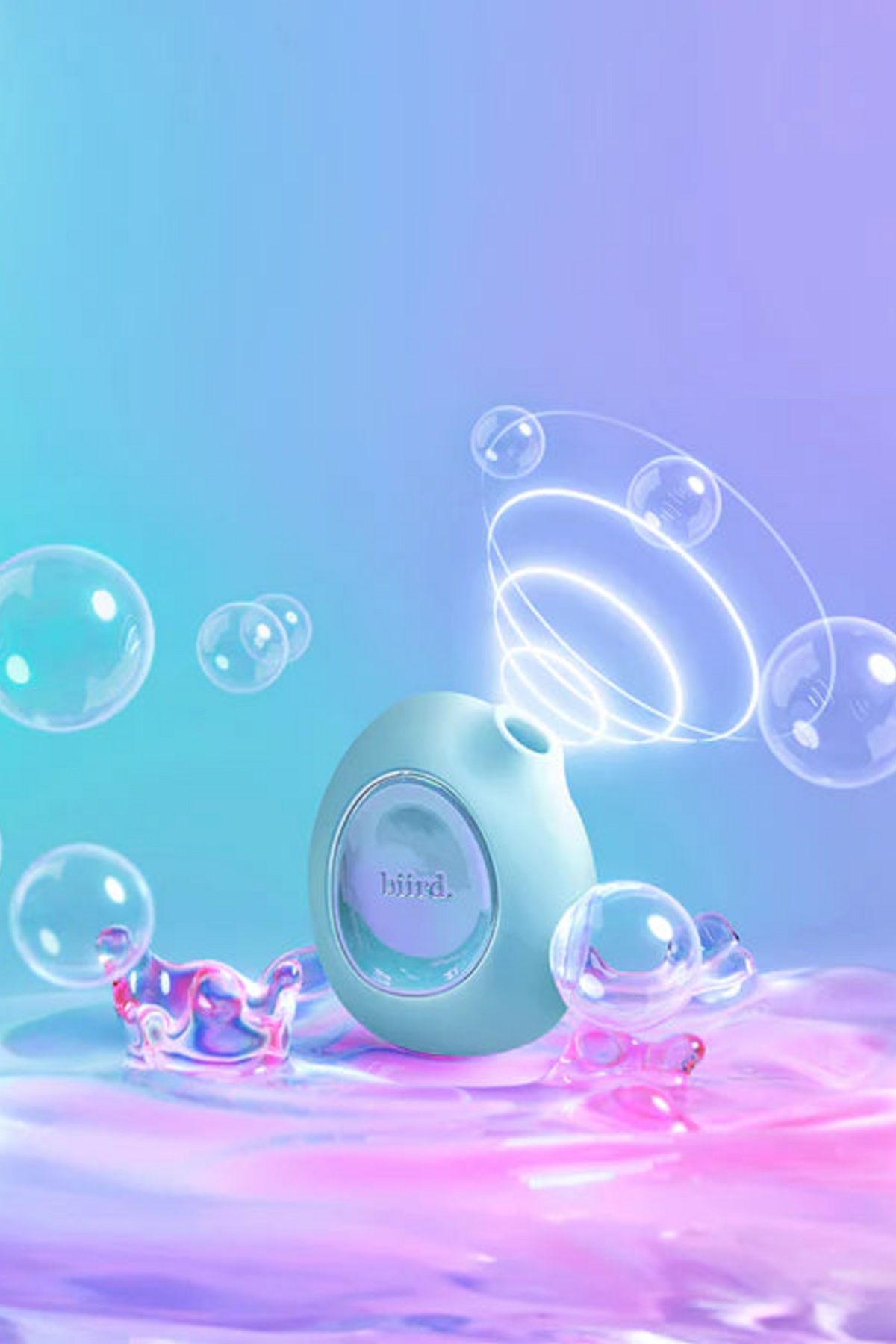Mint Lumii sitting in shimmering pink and aqua water surrounded by bubbles and air pulse rings, highlighting the fully waterproof design