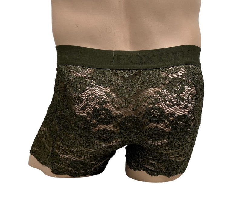 beige mannequin torso shows off the back of the green lace lingerie for men, showing that the lace is see thru