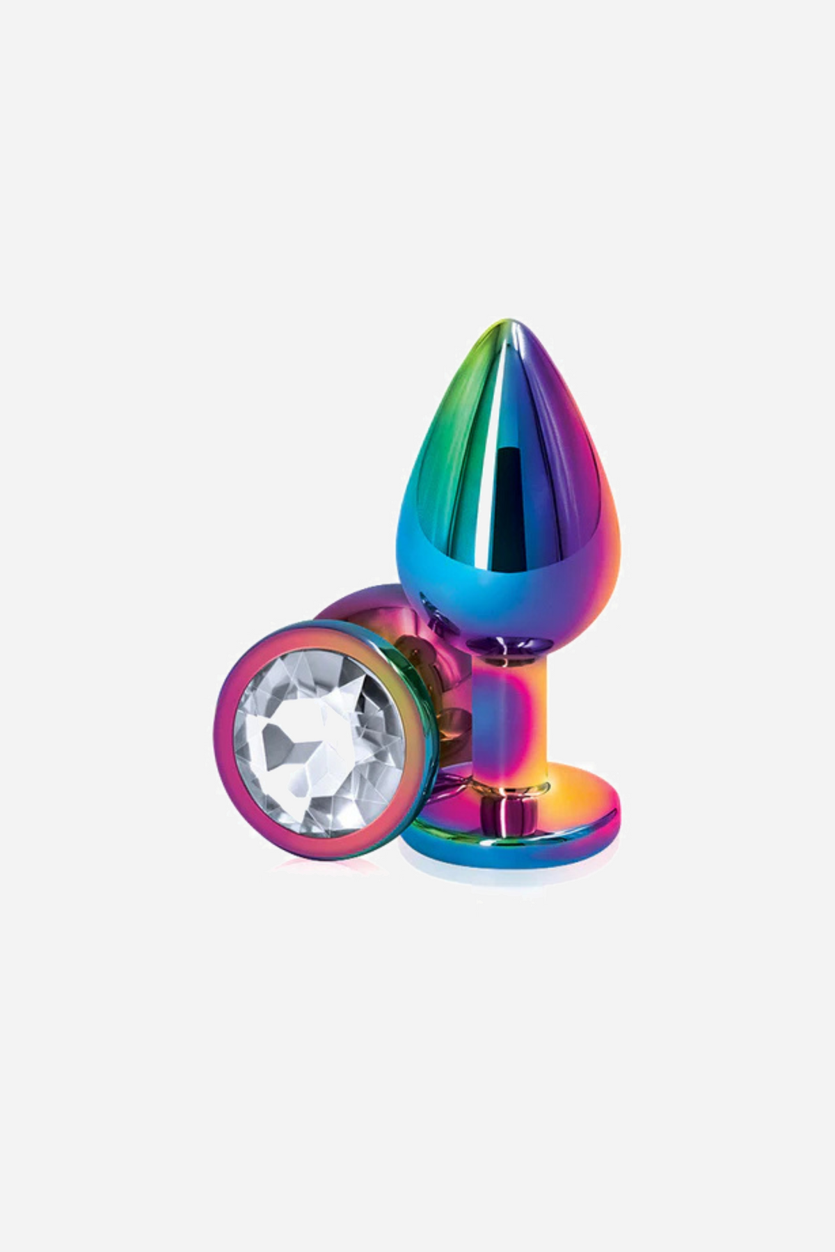 The medium multicolour metal plug standing upright beside its round base, the base set with a large clear faceted gem in the centre