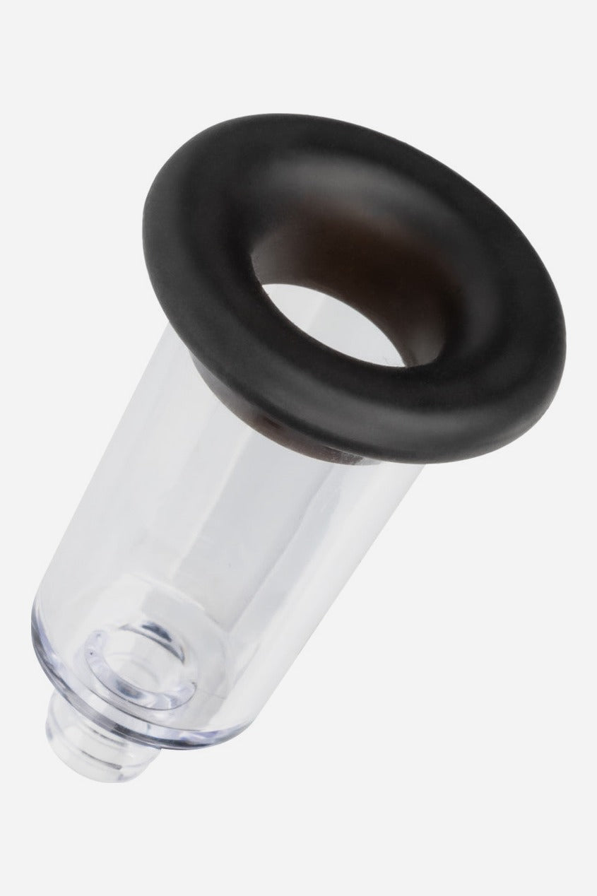 Another clear No Bounds pump cylinder with its black silicone sleeve, tilted to show the sleeve opening and the hose connector at the base