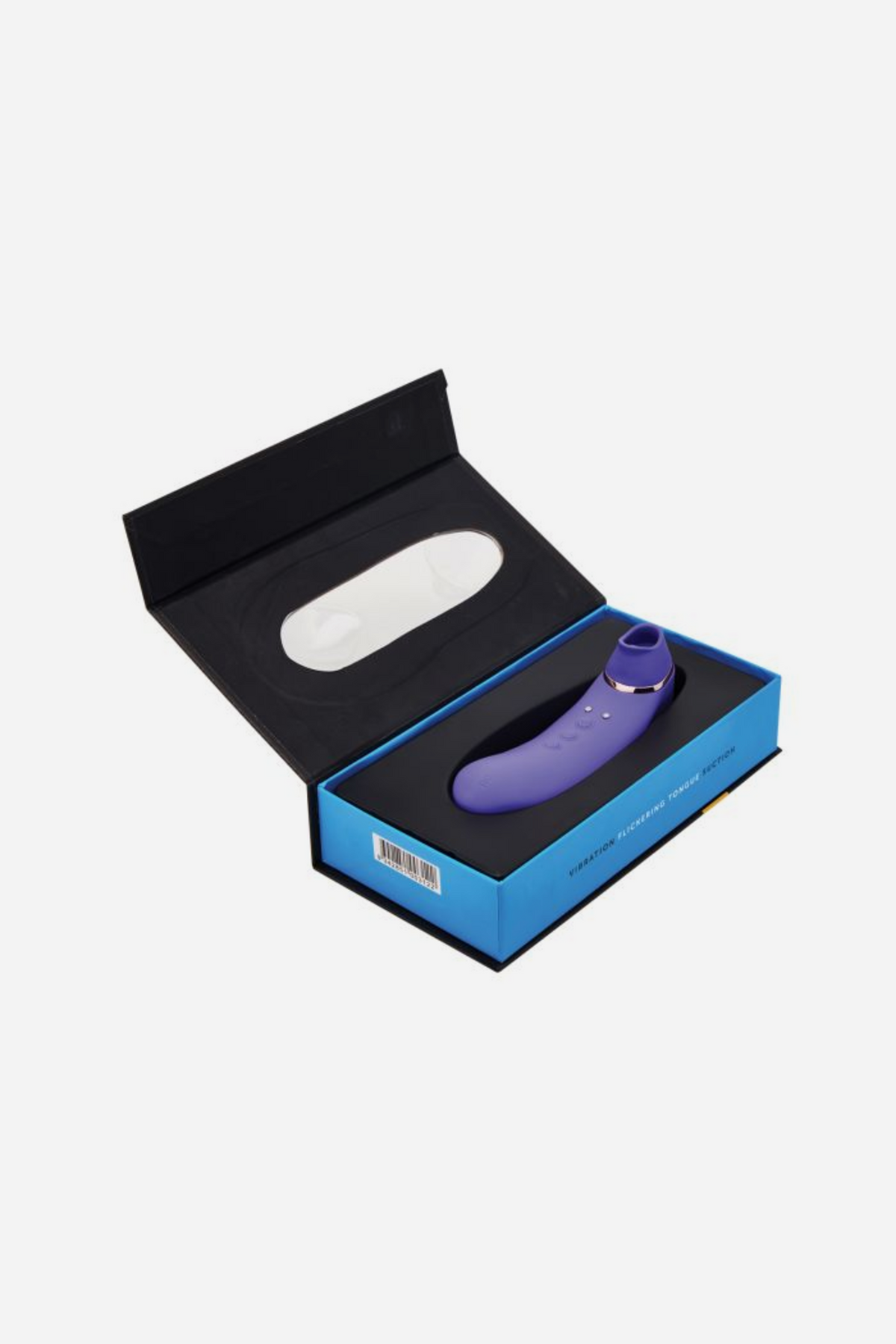 Nu Sensuelle Trinitii suction and tongue vibe in Ultra Violet displayed inside its open retail packaging box, shown on a light grey background