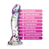 suction cup non phallic dildo with confetti . image shows dildo and the features of the queer sex toy, including that it is body safe, fragrance and paraffin free, latex and phthalate free, and harness compatible with a strong suction cup