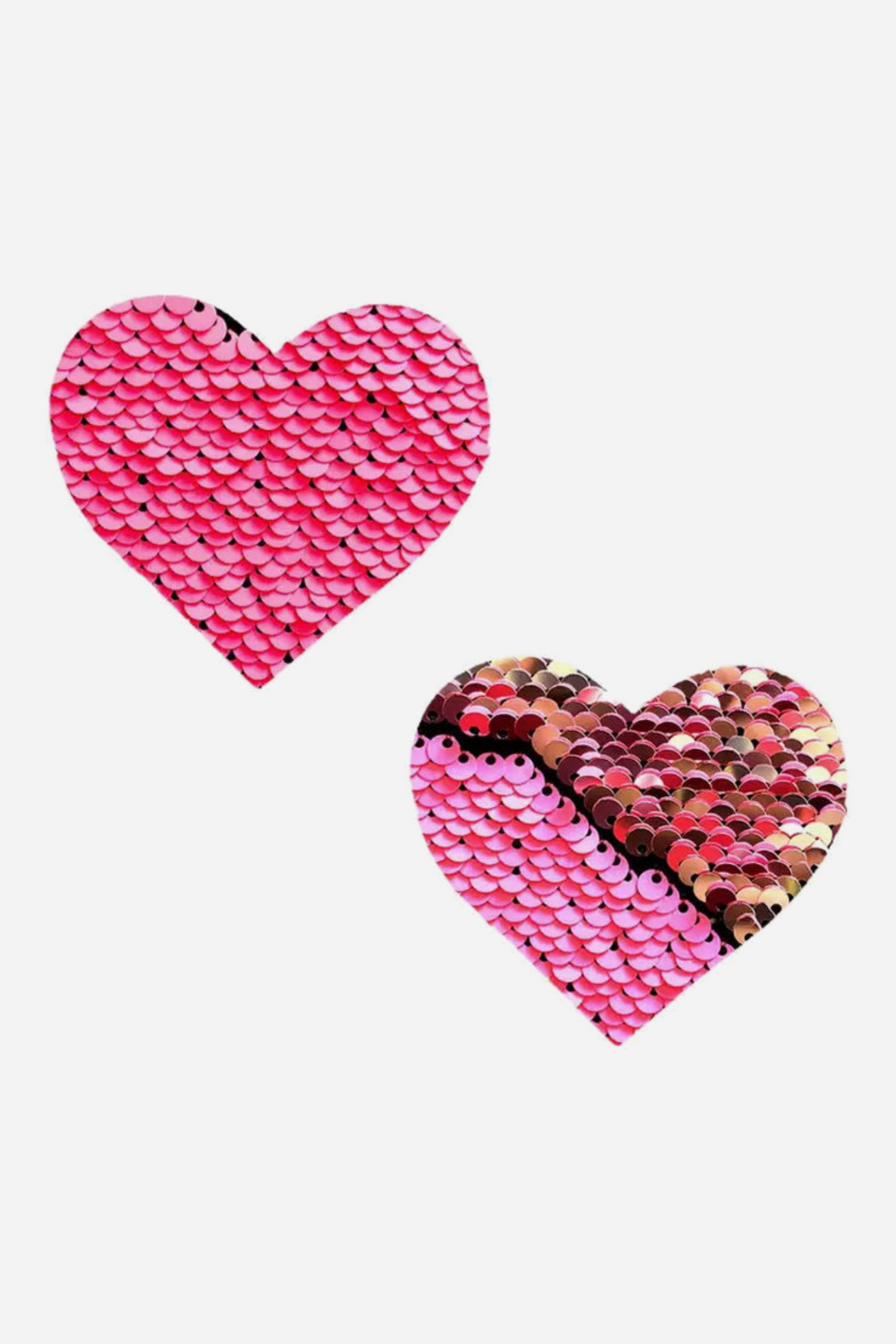 Pair of heart-shaped nipple pasties in hot pink flip sequins, one partly brushed to show the shimmering metallic sequin side underneath
