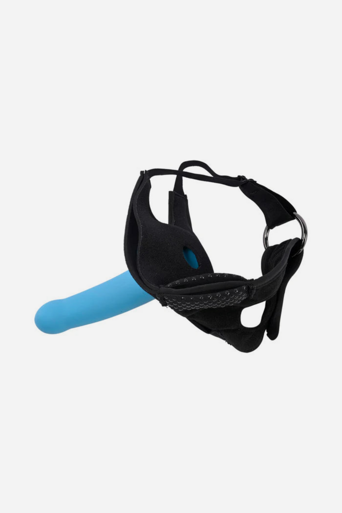 Pivot Forced Orgasm Toy Strap fitted with a blue dildo through its O-ring, showing the padded black thigh strap and adjustable buckles