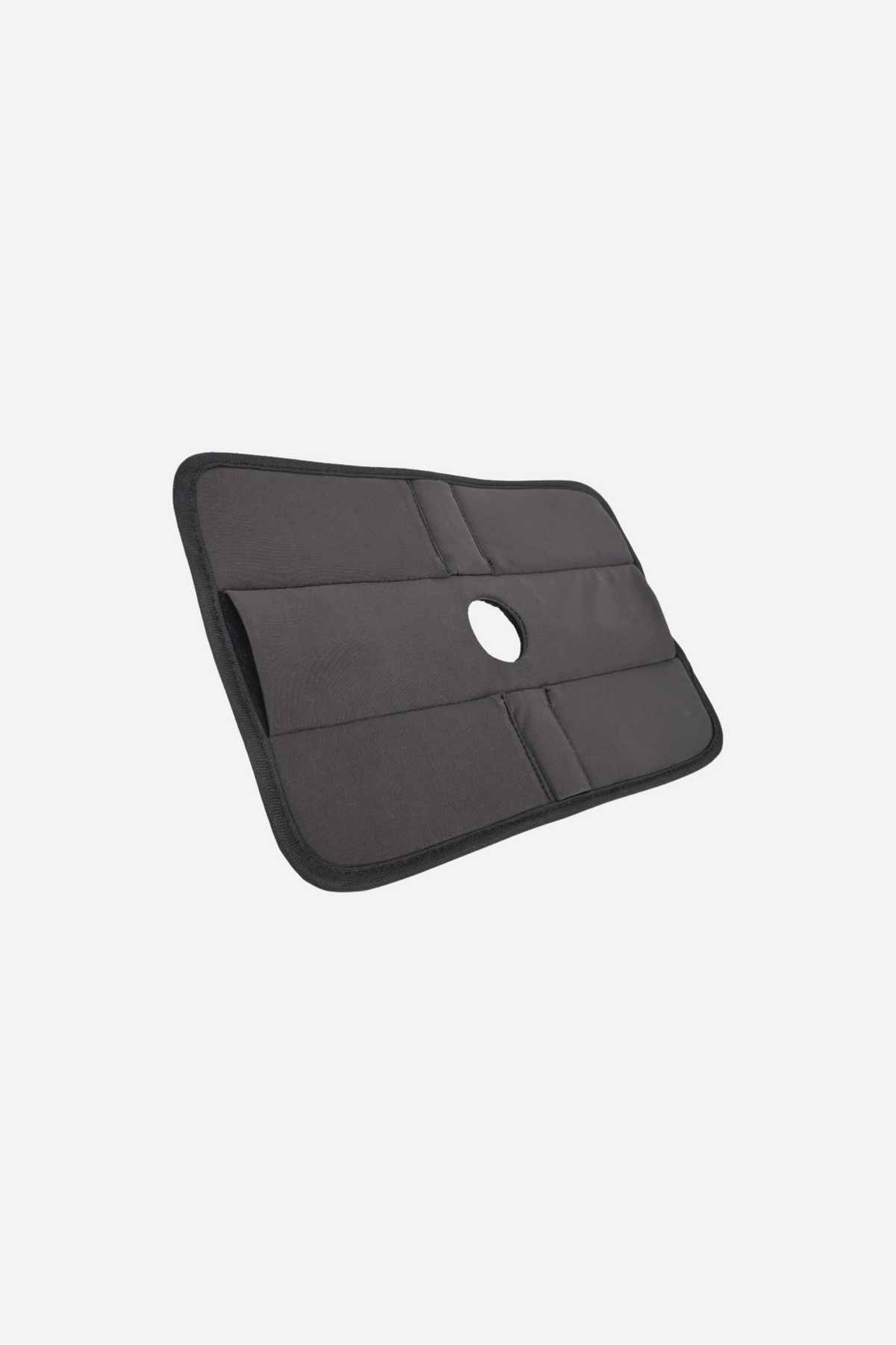 Pivot Play Pad toy holder in black, laid flat to show the padded fabric panel, central opening and the straps that hold a wand in place.