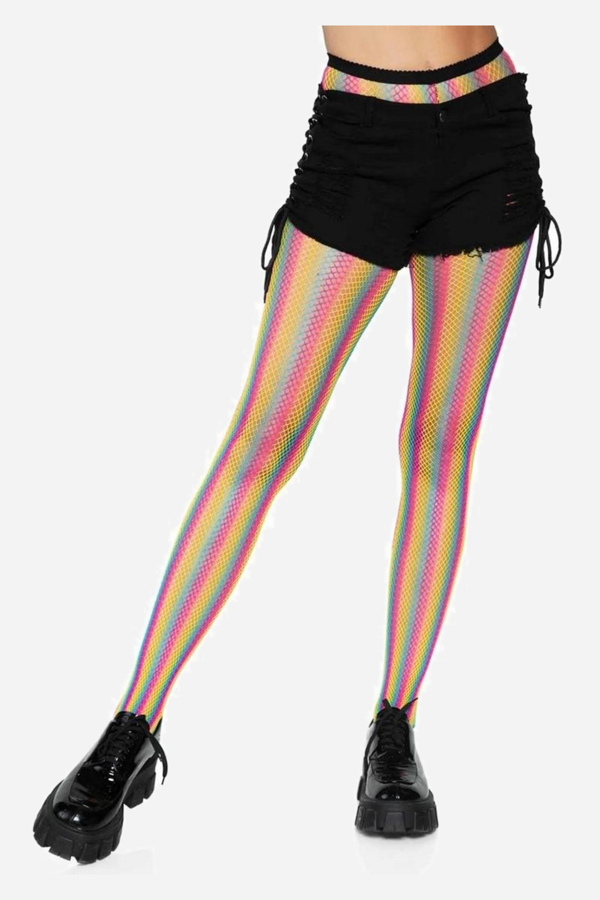 Rainbow fishnet tights styled with black ruched shorts and chunky platform boots, photographed from the waist down against a plain backdrop