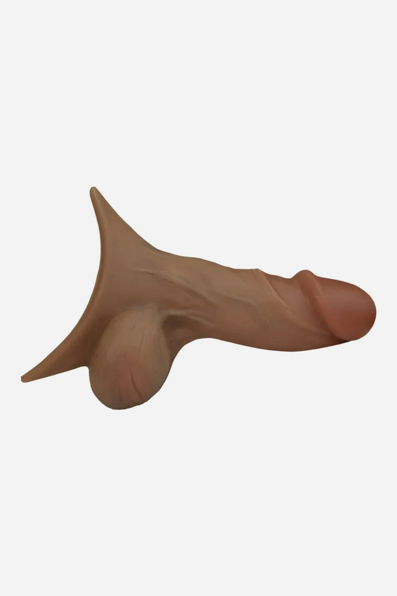 Side view of the Realistic 4.5 inch STP device in Dark Caramel with realistic veining, testicles and a flared funnel tip