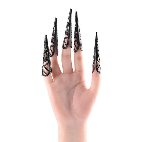 white hand wearing 3 inch pointed, decorative sensation finger tips for bdsm sensation play