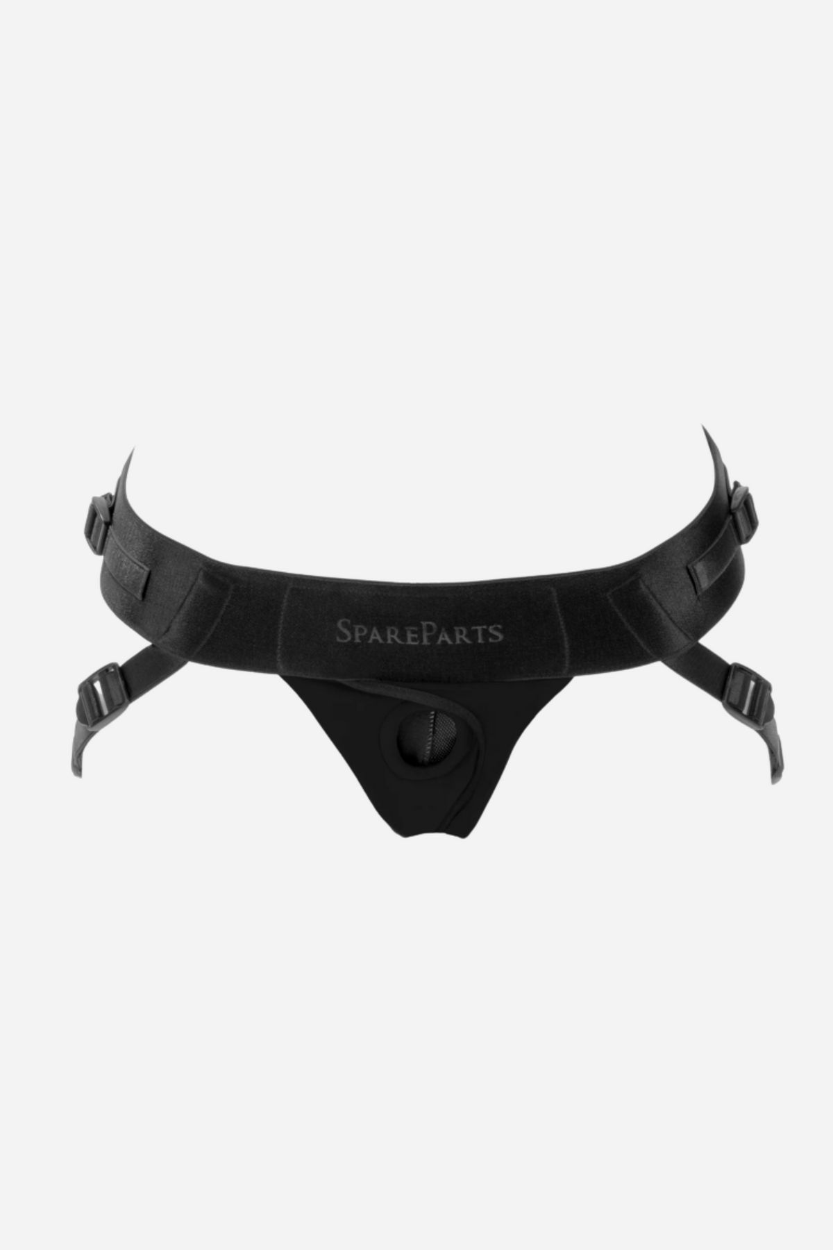 SpareParts Joque Harness in black, a jock-style strap-on harness with an adjustable waistband, two leg straps and front O-ring, on a grey background
