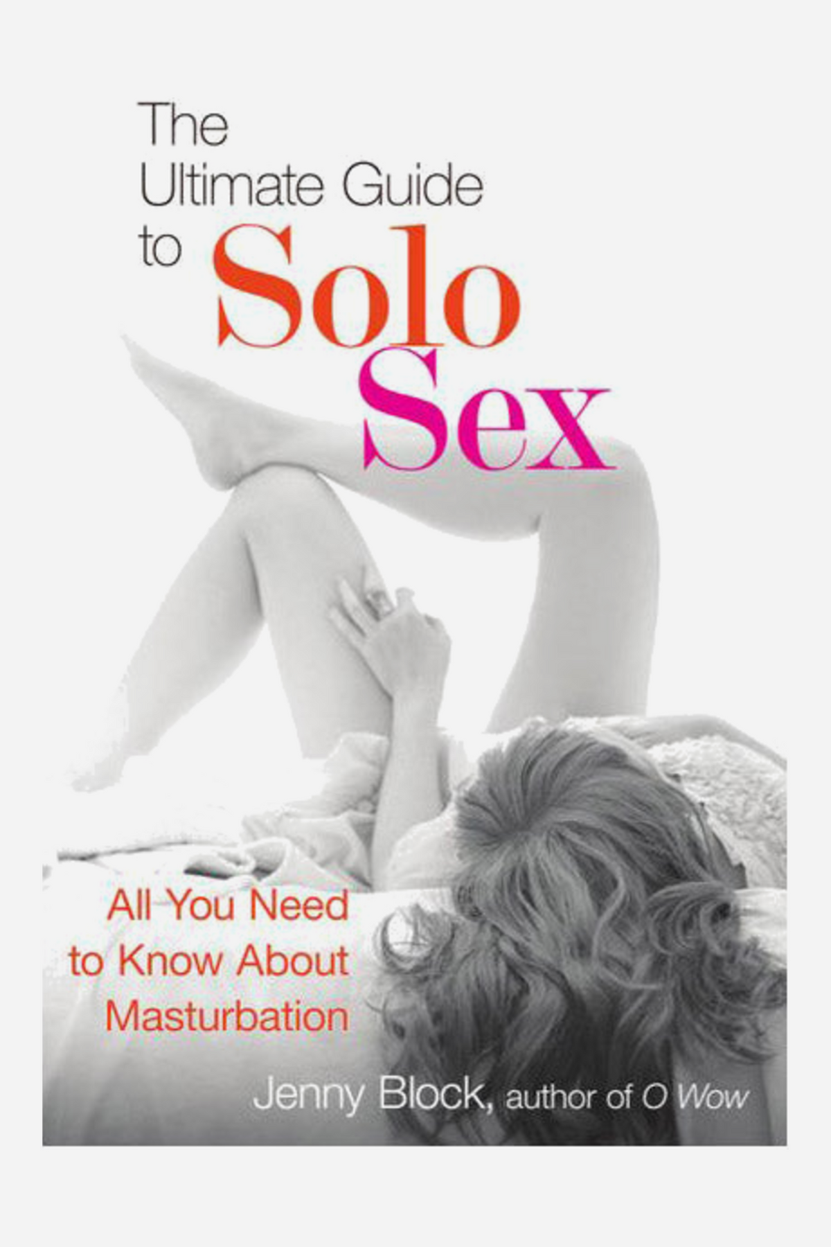 Cover of The Ultimate Guide to Solo Sex by Jenny Block, a soft black and white photo of a woman lying on rumpled sheets beneath pink and red title text