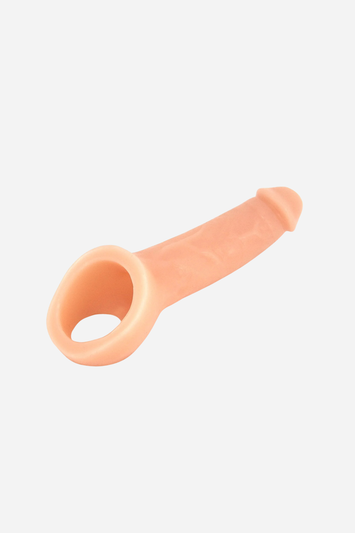 VixSkin Ride On dual density penis extender in Vanilla, showing the realistic textured sleeve and wide stretchy base ring on grey